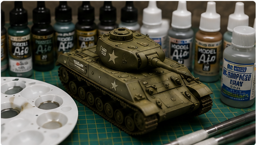 Scale model tank with paints and modeling supplies on a workbench