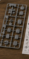 Plastic model kit sprues containing unassembled parts